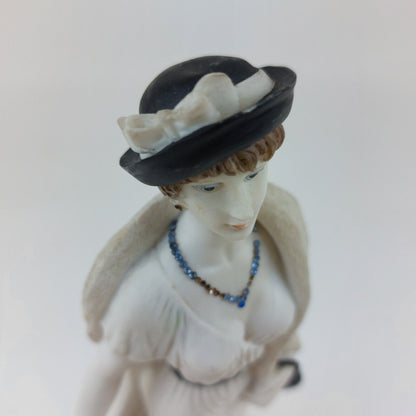 Art Deco Elegant Lady Figurine "Sheila" with Coat, Hat, and Bag - 11.75" - white