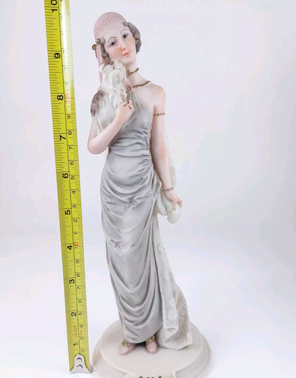 A. Belcari Dear Figurine, Lady with Dog, 1987 Porcelain, 9.5", Italian