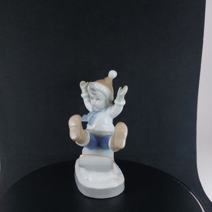 Vintage Germany-Made Porcelain Kid on Sled Figurine, Good Condition, 12cm