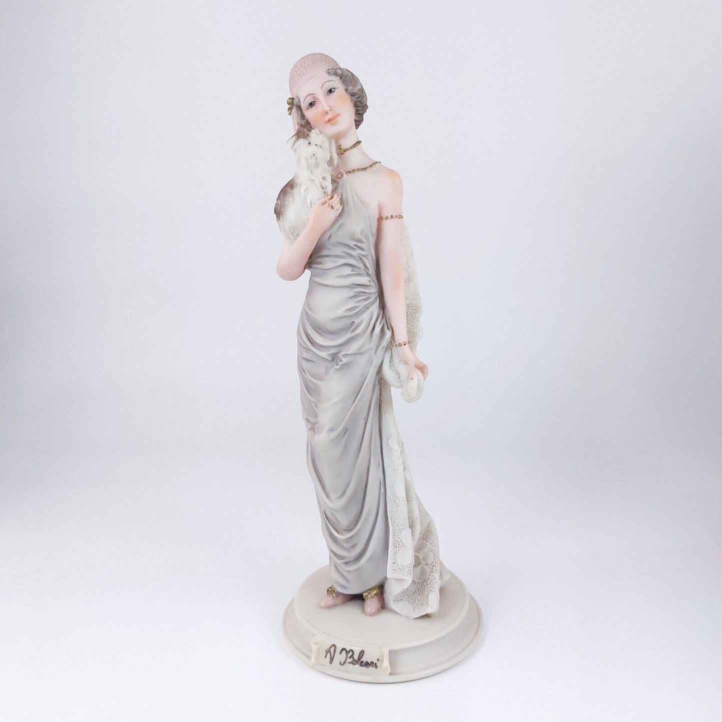 A. Belcari Dear Figurine, Lady with Dog, 1987 Porcelain, 9.5", Italian