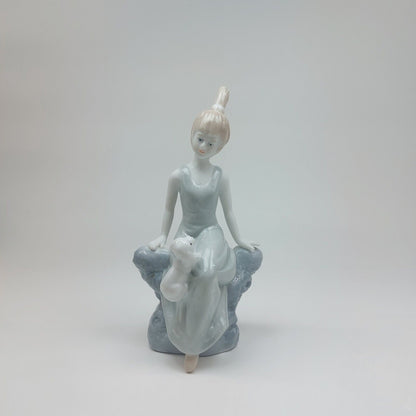 Fine Porcelain Figurine - Lady Sitting with Dog, Handcrafted Glaze