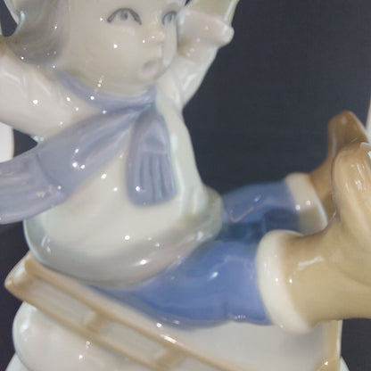 Vintage Germany-Made Porcelain Kid on Sled Figurine, Good Condition, 12cm