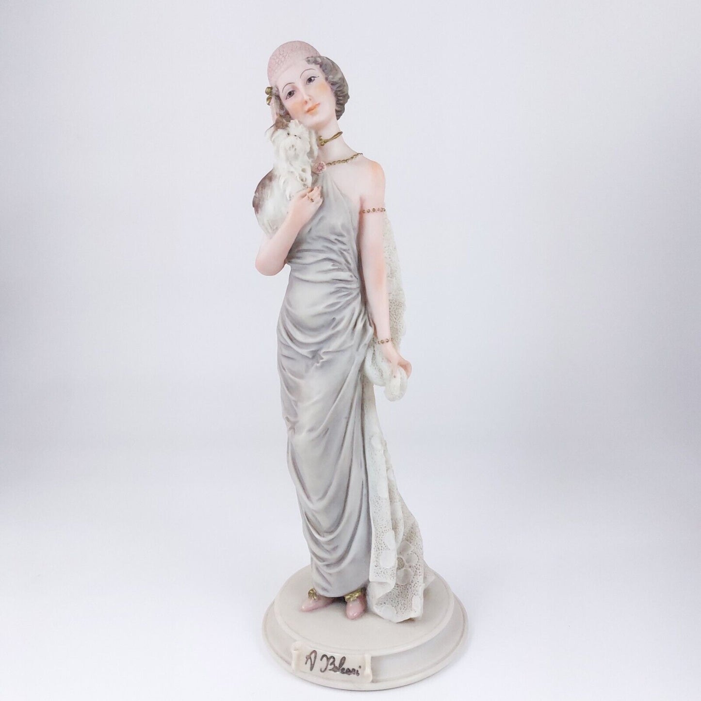 A. Belcari Dear Figurine, Lady with Dog, 1987 Porcelain, 9.5", Italian