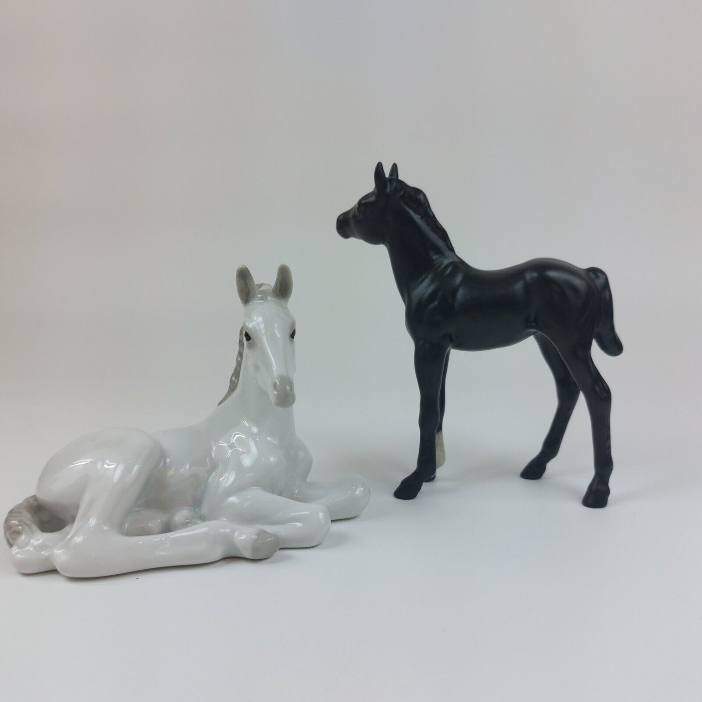 White Horse Recumbent Lomonosov Porcelain - USSR & Black Horse Figurine Beswick