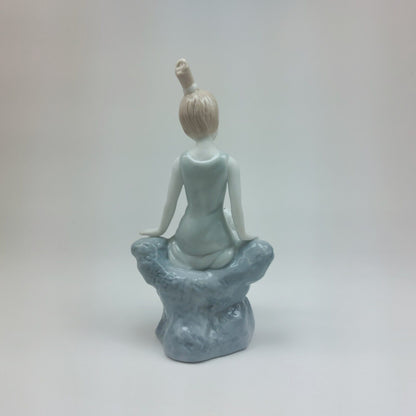 Fine Porcelain Figurine - Lady Sitting with Dog, Handcrafted Glaze