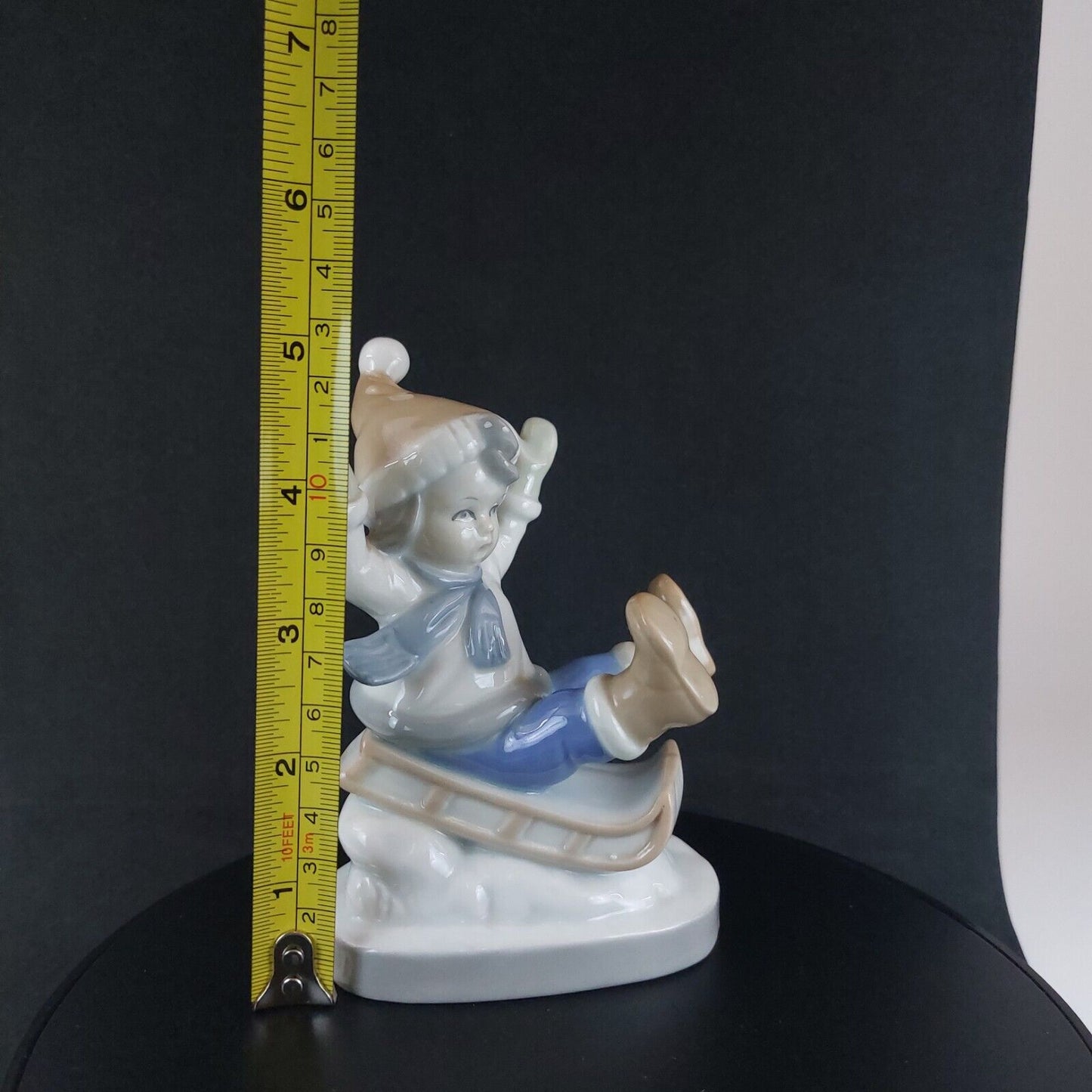 Vintage Germany-Made Porcelain Kid on Sled Figurine, Good Condition, 12cm